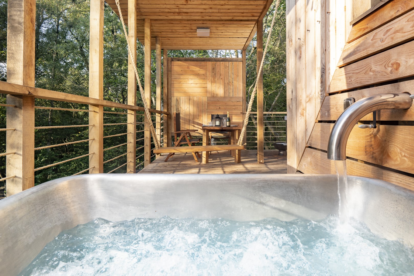 Pinwheel treehouse hot tub and swing in Dorset adults-only holidays UK