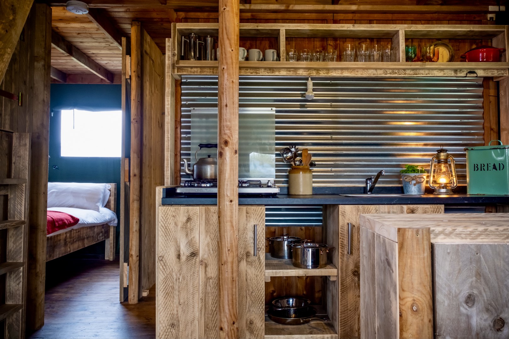 Rustic interiors at Sloeberry Farm safari tent lodges in West Wales