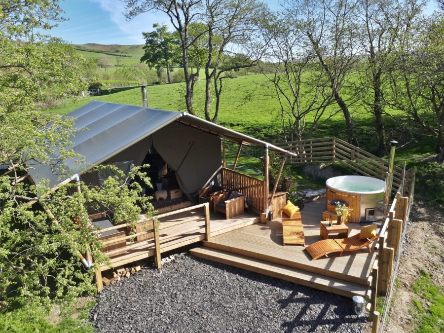 Stellar Safari Lodge tents with hot tub outside in rural Mid Wales